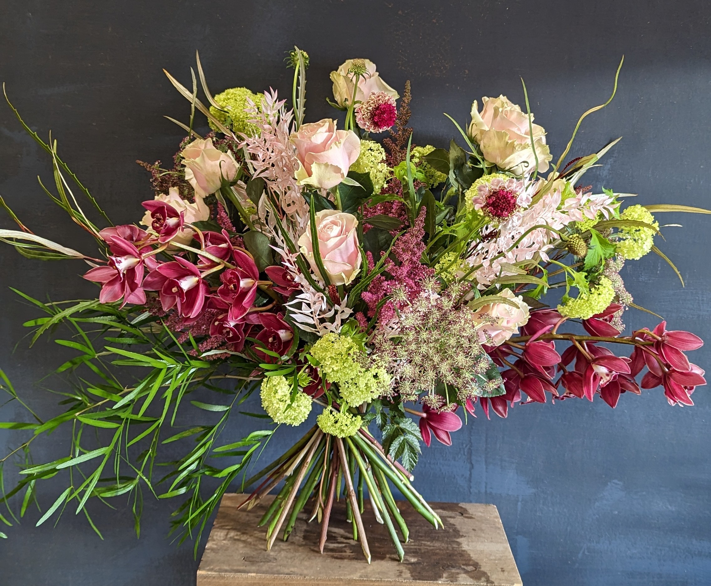 Pink rose and orchid bouquet